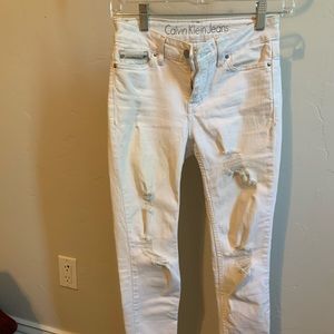 white distressed Calvin Klein jeans